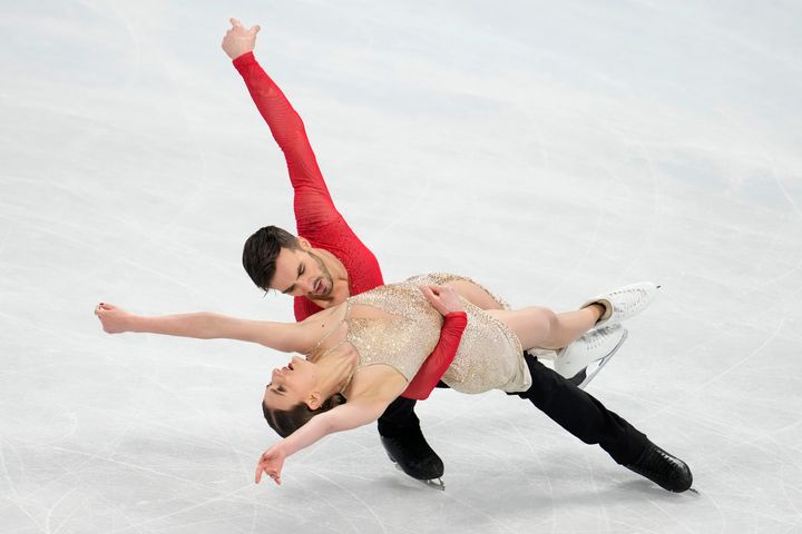 Gabriella Papadakis and Guillaume Cizeron, of France, perform their routine in the ice dance competition during the figure skating at the 2022 Winter Olympics.