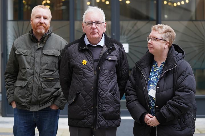 Noel Thomas (centre) with son Edwin and daughter Sian, arrives at the International Dispute Resolution Centre in London for the Post Office Horizon IT inquiry.