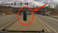 Dashcam Captures Terrifying Moment A Runaway Tire Slams Right Into A Cop Car