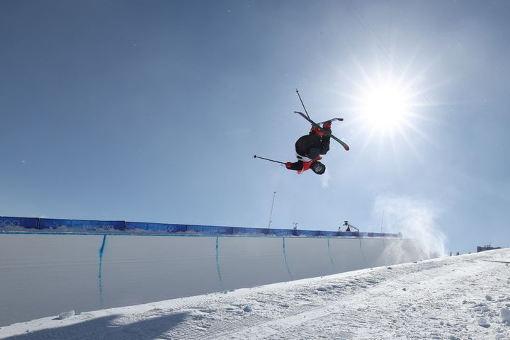 Gus Kenworthy of Team Great Britain performs a trick during the Freestyle Skiing Halfpipe Training session on Day 10 of the 2022 Winter Olympics. 