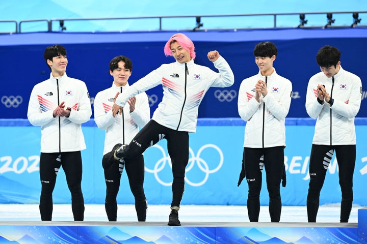 Silver medalist Kwak Yoon-gy celebrates during the medal ceremony.