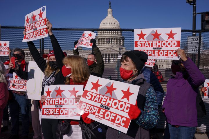 Advocates for statehood for the District of Columbia rally near the Capitol prior to a House of Representatives hearing on creating a 51st state.