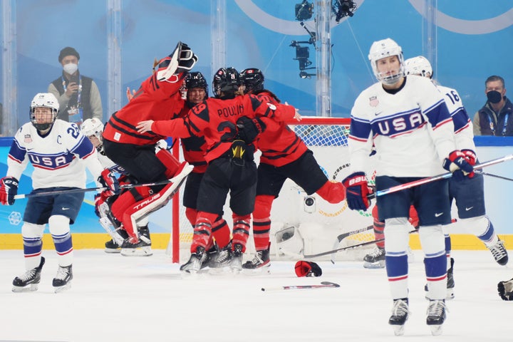 Team Canada celebrates their win over Team United States in the Women's Ice Hockey match-up at the Beijing 2022 Winter Olympic Games on Thursday.