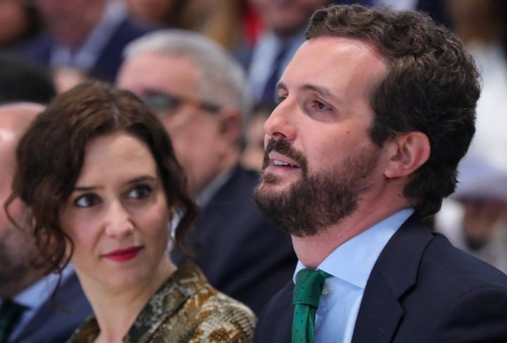 Ayuso y Casado, en un acto.