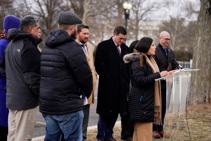 Veterans, refugee advocates and Afghan evacuees urge members of Congress to pass an Afghan Adjustment Act in Washington, D.C., on Feb. 14, 2022. 