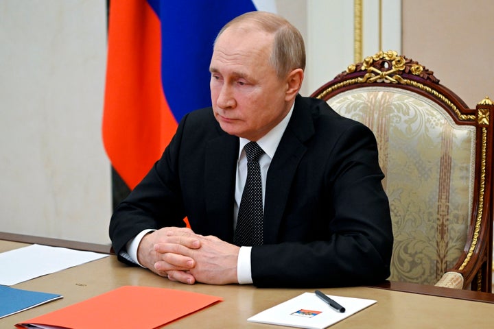 Russian President Vladimir Putin chairs a Security Council meeting via video conference at the Novo-Ogaryovo residence outside Moscow, Russia, on Feb. 18, 2022.