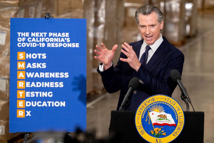 Gov. Gavin Newsom announces the next phase of California's COVID-19 response called "SMARTER," during a press conference at the UPS Healthcare warehouse in Fontana, Calif. on Feb. 17, 2022. 