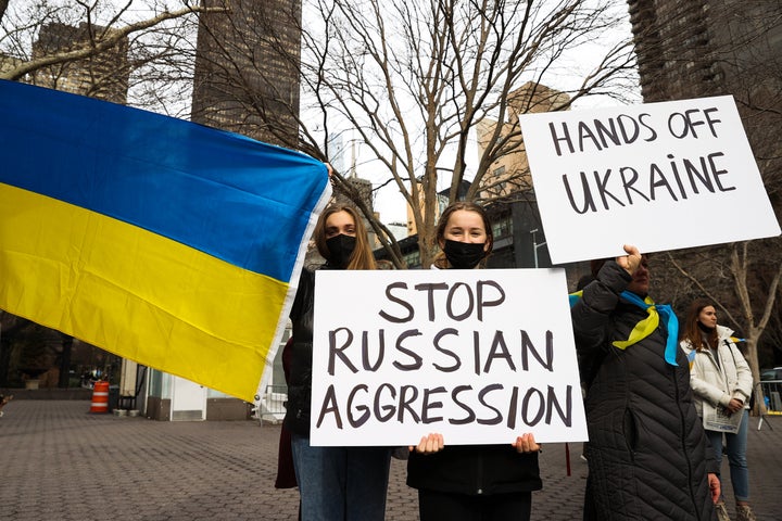 People gathered near the United Nations Headquarters in New York City protest Russian President Putin's actions in Ukraine on February 17, 2022. (Photo by Tayfun Coskun/Anadolu Agency via Getty Images)