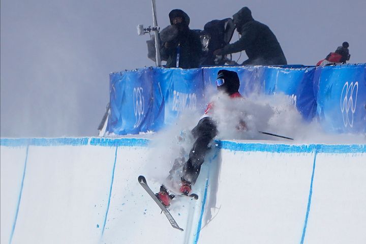 Britain's Gus Kenworthy crashes during the men's halfpipe finals.