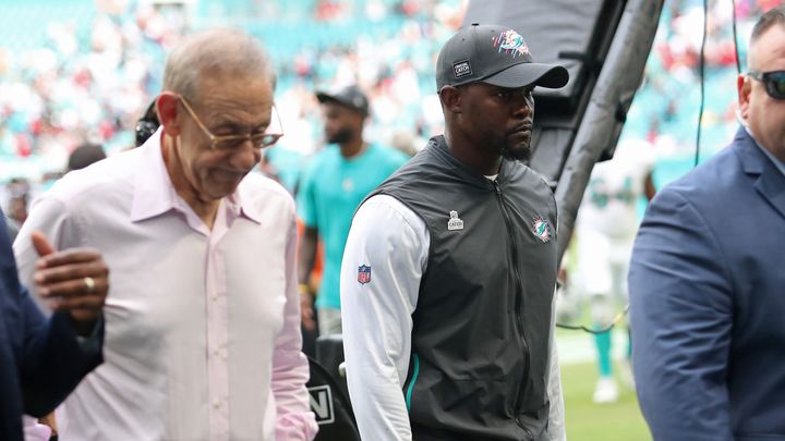 Miami Dolphins head coach Brian Flores walks off the field next to team owner Stephen Ross, left, after a loss to the Atlanta Falcons at Hard Rock Stadium on Oct. 24, 2021, in Miami Gardens, Florida. (John McCall/Sun Sentinel/Tribune News Service via Getty Images)