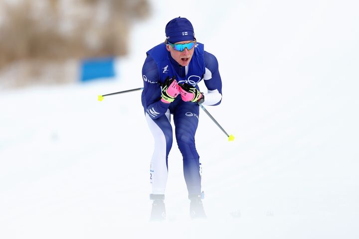 Remi Lindholm, pictured in an earlier race at the Beijing Winter Olympics, applied a heat pack to the affected area after Saturday's event.