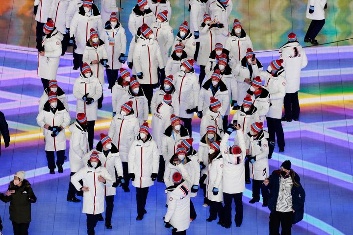 Norway athletes walk at the closing ceremony of the 2022 Winter Olympics, Sunday, Feb. 20, 2022, in Beijing. (AP Photo/Brynn Anderson)