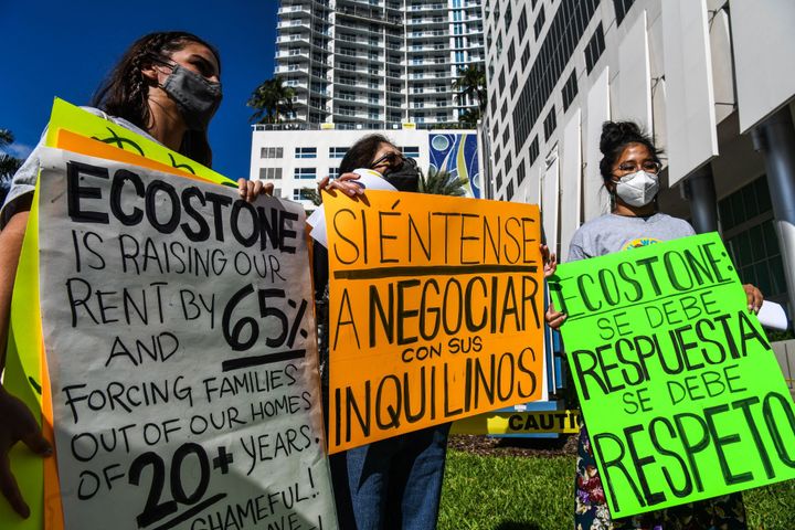 Members of the Miami Workers Center protest rent hikes outside a landlord's office building in Miami, Florida on January 19.