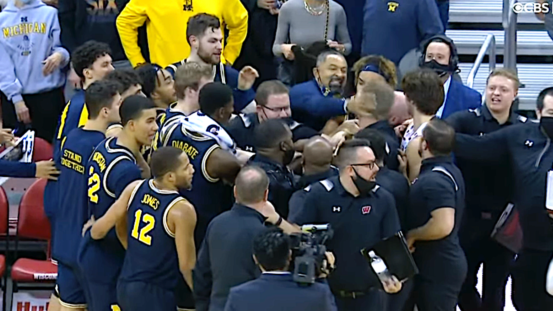 Michigan Basketball Coach Strikes Wisconsin Assistant In Dustup After Tough Loss - WorldNewsEra Michigan Basketball Coach Strikes Wisconsin Assistant In Dustup After Tough Loss - WorldNewsEra