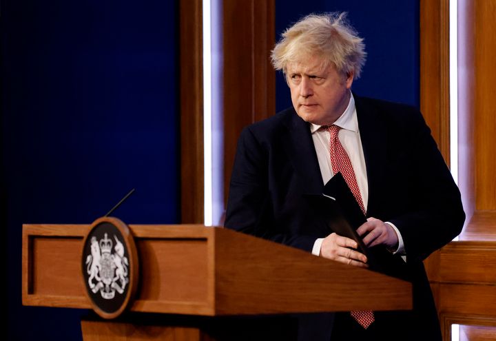 Britain's Prime Minister Boris Johnson, seen during a media briefing in Downing Street, London on Monday, outlined the government's new long-term COVID-19 plan.