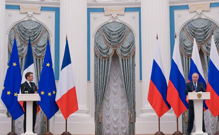 France's President Emmanuel Macron (L) and Russia's President Vladimir Putin give a joint press conference after a meeting at the Moscow Kremlin. (Photo by Sergei Guneyev\TASS via Getty Images)