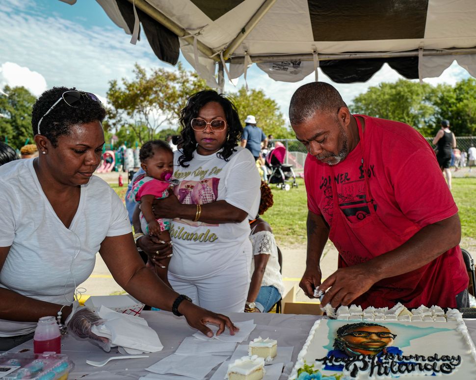 Consuming our pain: Valerie Castile, center, the mother of Philando Castile, who was killed by police in Minnesota in 2016, celebrates his birthday.