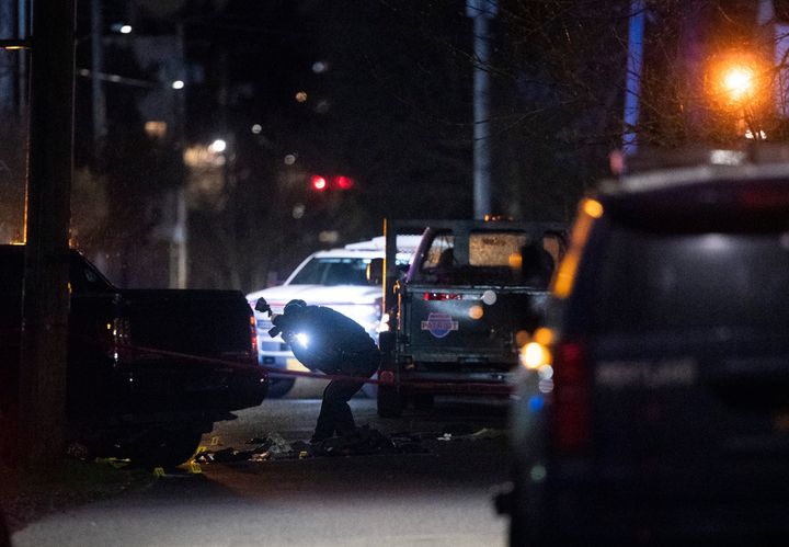 Police respond to a shooting in Portland, Oregon, on Feb. 19, 2022. One person was killed and five others were wounded in a shooting at the Portland park where a march was planned to protest police violence. 
