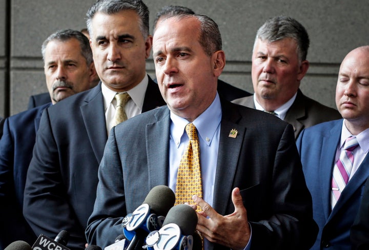 Ed Mullins, center, speaks during a news conference in the Bronx borough of New York, on May 31, 2017. 