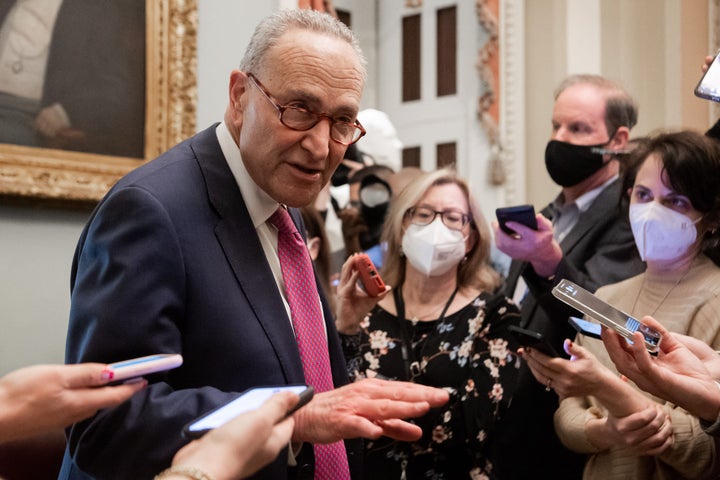 Senate Majority Leader Chuck Schumer speaks with the press as he leaves a lunch with Senate Democrats at the U.S. Capitol on Feb. 17.