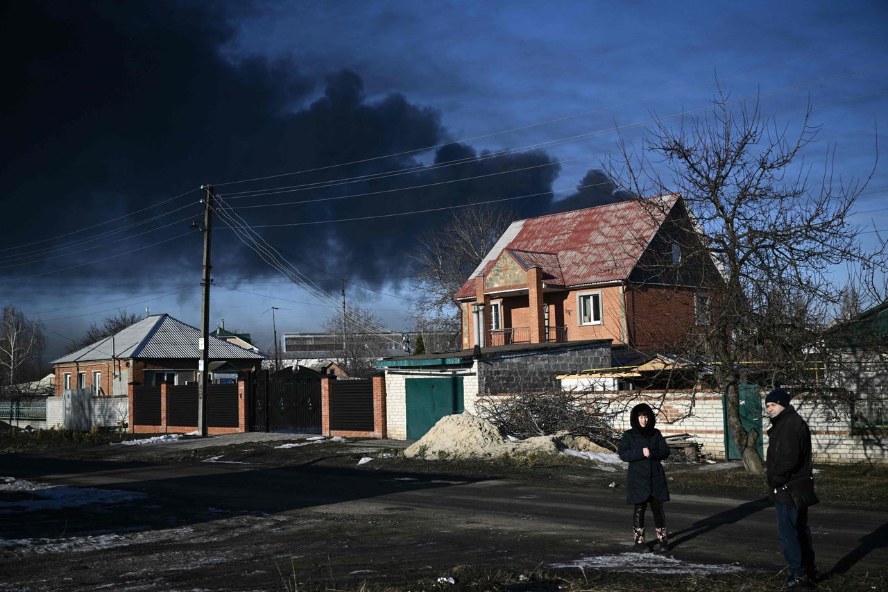 Black smoke rises from a military airport in Chuguyev, near Kharkiv.