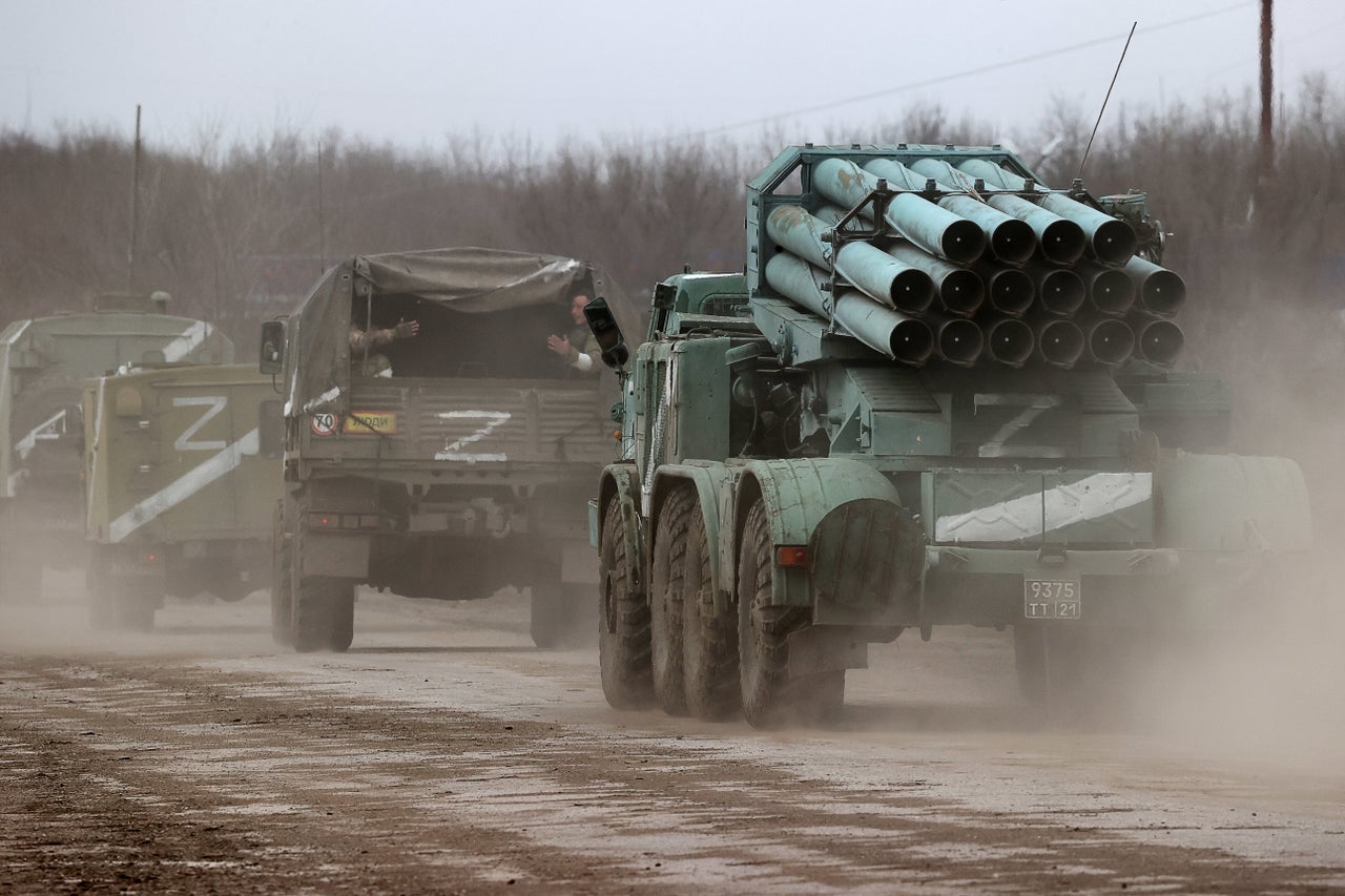 A column of military vehicles leaves the town of Armyansk, northern Crimea.