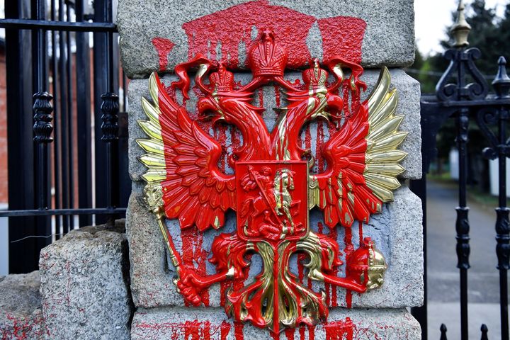 The Russian emblem is defaced with red paint outside the Embassy of Russia in Dublin, Ireland, February 24, 2022. REUTERS/Clodagh Kilcoyne