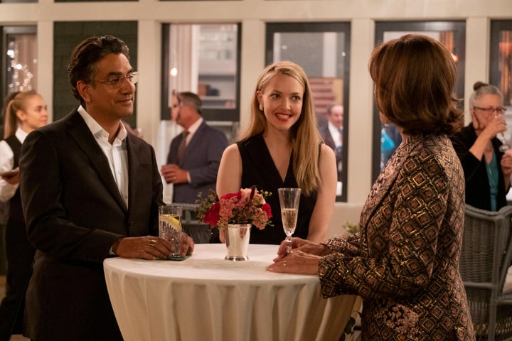 Sunny Balwani (Naveen Andrews), Elizabeth Holmes (Amanda Seyfried) and Charlotte Shultz (Anne Archer) in "The Dropout."
