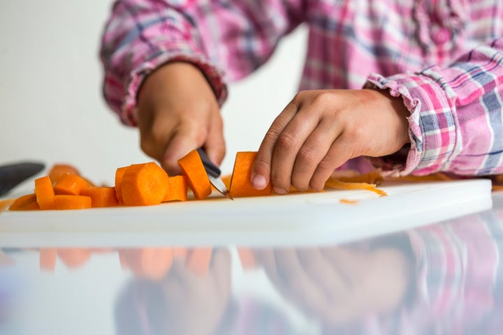 Starting around age 9, it's OK to let children start safely handling sharper cutting tools with adult supervision.