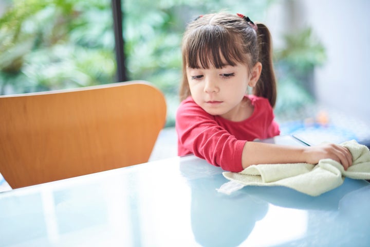 Starting around four, kids can help you with the dreaded task of cleaning up.