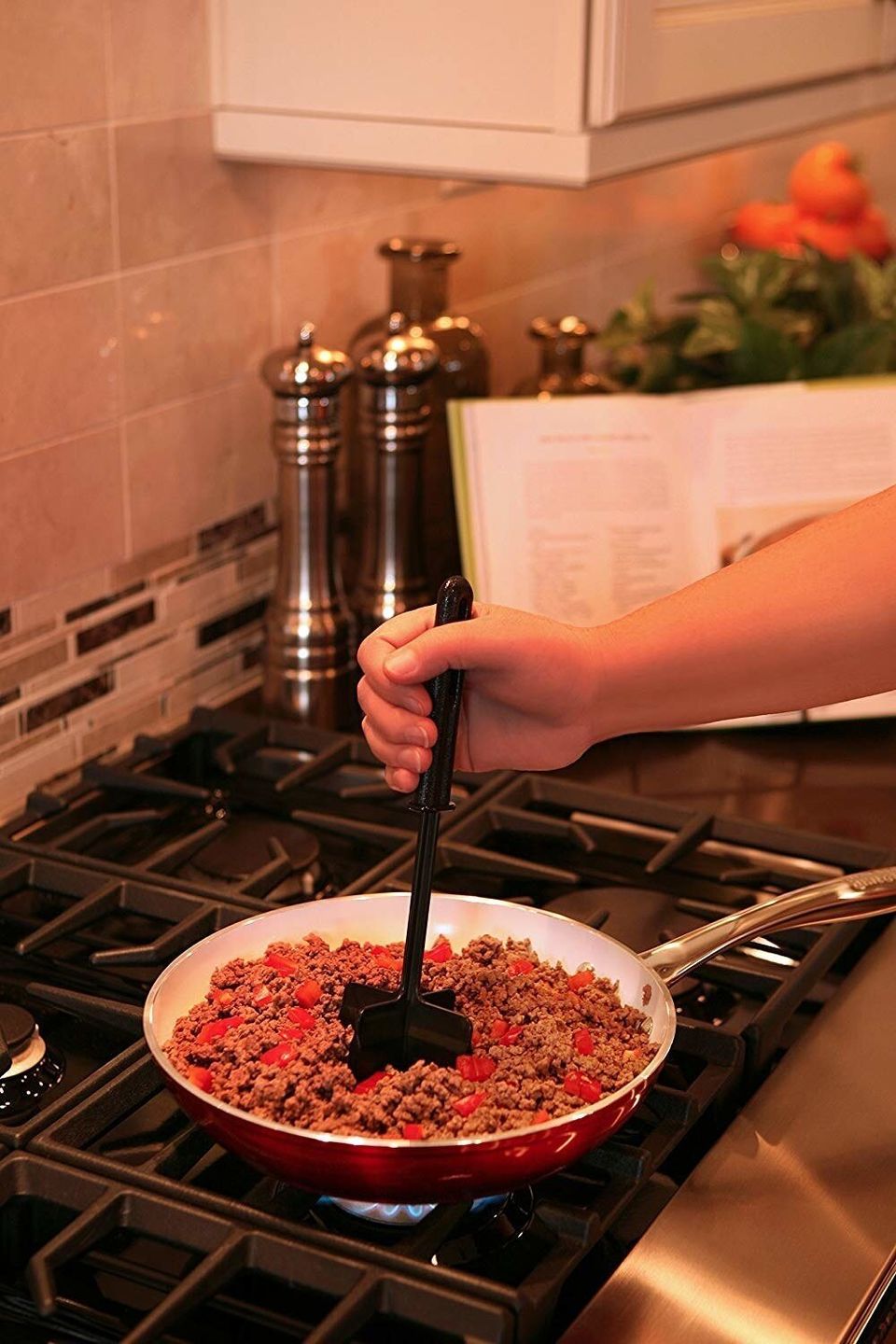 A 2-in-1 chop 'n' stir tool ideal for thoroughly cooking ground meat or mashed potatoes