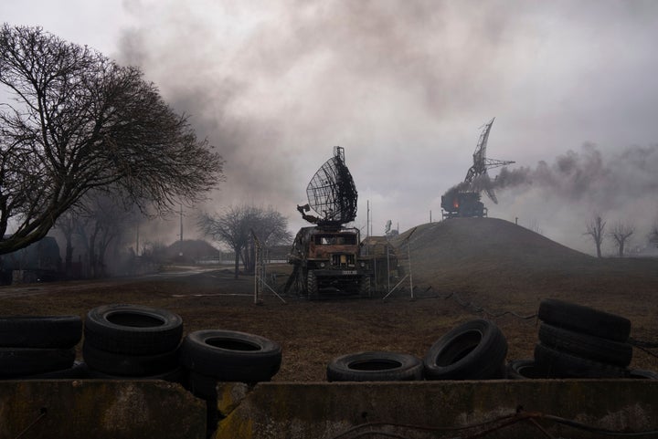 Smoke rise from an air defence base in the aftermath of an apparent Russian strike in Mariupol, Ukraine.