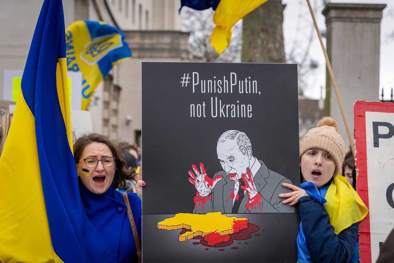 Demonstrators gather outside of Downing Street in London February, 24, 2022.