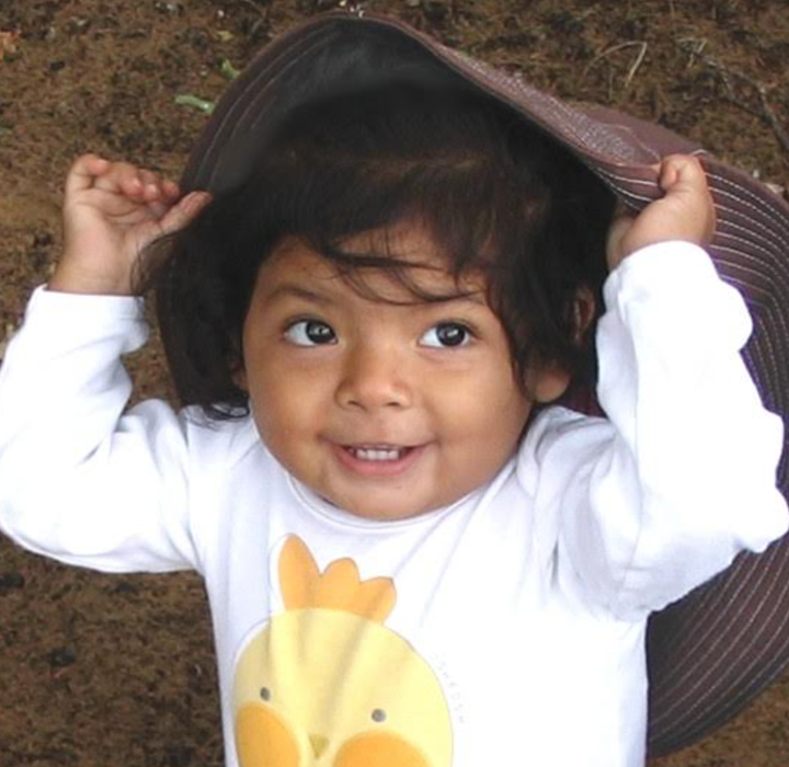 Baby Dalia, pre-diagnosis, on the beach.