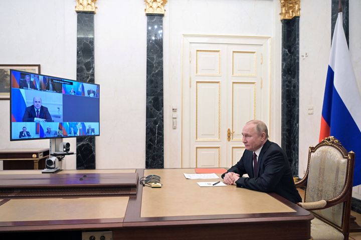 Russian President Vladimir Putin chairs a meeting with members of the Security Council via a video link in Moscow, Russia February 25, 2022. Sputnik/Alexey Nikolsky/Kremlin via REUTERS ATTENTION EDITORS - THIS IMAGE WAS PROVIDED BY A THIRD PARTY.