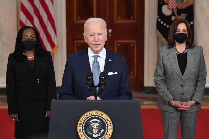 President Joe Biden, center, with Vice President Kamala Harris (right), introduces his nominee for the Supreme Court, Judge Ketanji Brown Jackson (left), at the White House on Feb. 25.