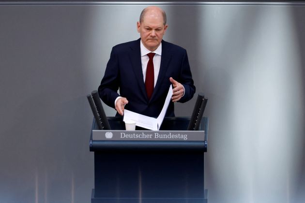 German Chancellor Olaf Scholz addresses an extraordinary session, after Russia launched a massive military operation against Ukraine, at the lower house of parliament Bundestag in Berlin, Germany, February 27, 2022. REUTERS/Michele Tantussi