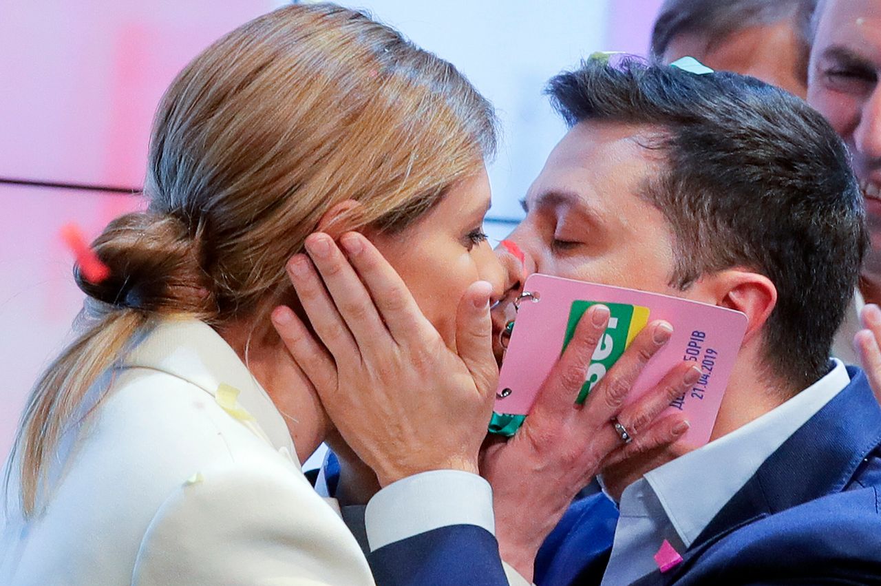 Zelenskyy and his wife Olena kiss after the second round of presidential elections in Kyiv, in 2019. 