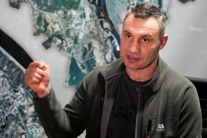 Vitali Klitschko, Kyiv Mayor and former heavyweight champion gestures while speaking during his interview with the Associated Press in his office in the City Hall in Kyiv, Ukraine, Sunday, Feb. 27, 2022. A Ukrainian official says street fighting has broken out in Ukraine's second-largest city of Kharkiv. Russian troops also put increasing pressure on strategic ports in the country's south following a wave of attacks on airfields and fuel facilities elsewhere that appeared to mark a new phase of Russia's invasion.