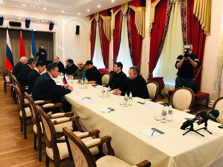 Delegations of Ukraine and Russia arrive to attend peace talks between two countries at the Gomel region, which borders both sides to the conflict in Belarus on Feb. 28, 2022. P