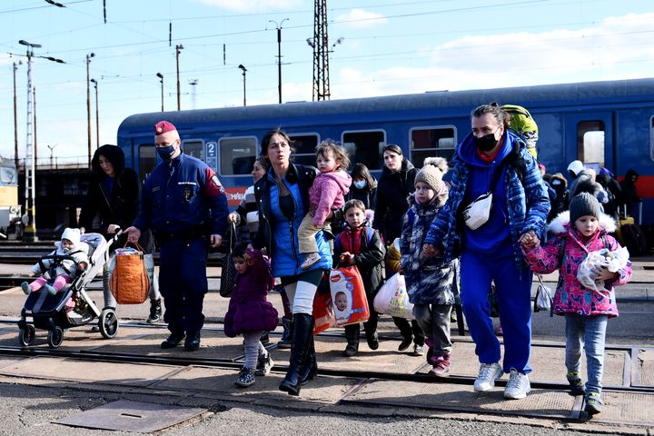 Refugees fleeing conflict from neighbouring Ukraine arrive at Zahony, Hungary.