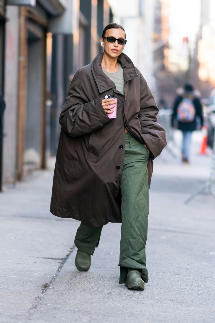 Model and actress Irina Shayk wearing Ugg Tasman X in burnt olive during New York Fashion Week in February 2022.