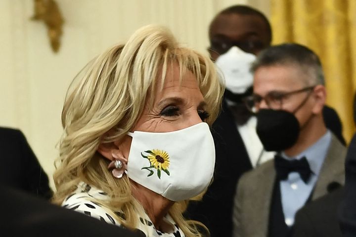 Jill Biden wears a sunflower mask, the national flower of Ukraine, in support for the Ukrainian people, during an event celebrating Black History Month in the East Room of the White House February 28, 2022, in Washington, DC. 