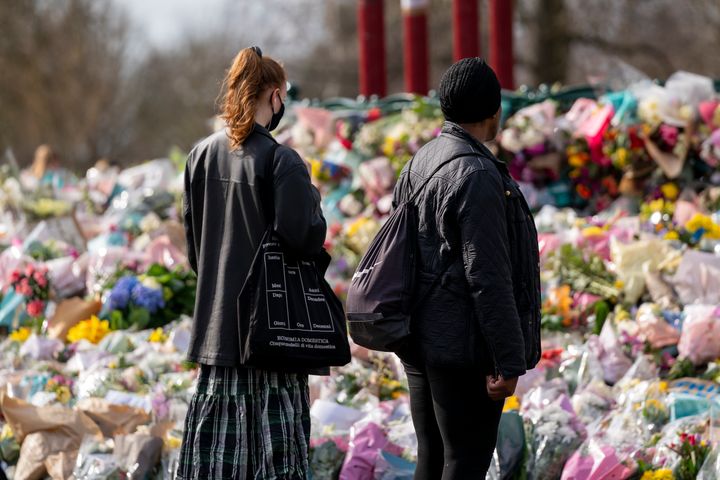 Members of the public paying their respects to Sarah Everard at the bandstand, Clapham Common, on March 15, 2021. 