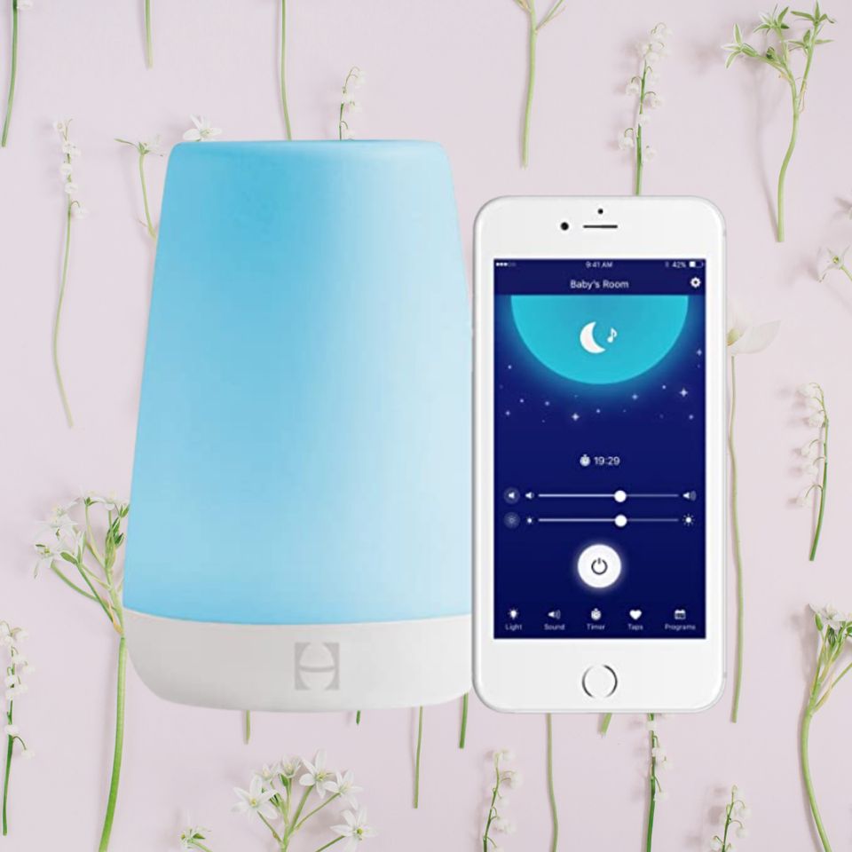 A sound machine, night light and alarm clock in one.