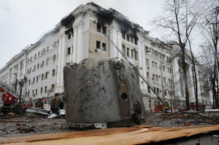 A rocket fragment lies on the ground next to a building of Ukrainian Security Service after a rocket attack in Kharkiv, Ukraine's second-largest city.