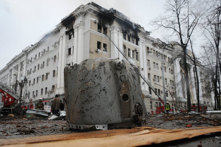 Extra Than 1 Million Folks Have Fled Ukraine Since Russia's Invasion Started Final Week 2 A rocket fragment lies on the ground next to a building of Ukrainian Security Service after a rocket attack in Kharkiv, Ukraine's second-largest city.