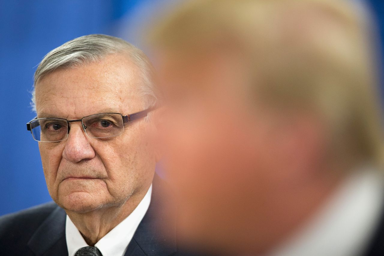 Former Sheriff Joe Arpaio joins then-presidential candidate Donald Trump at a 2016 campaign rally in Iowa. Last week, Arpaio spoke at a white nationalist conference.
