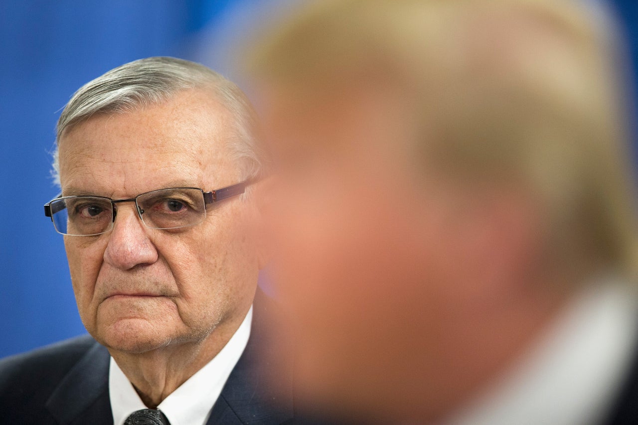 Former Sheriff Joe Arpaio joins then-presidential candidate Donald Trump at a 2016 campaign rally in Iowa. Last week, Arpaio spoke at a white nationalist conference.