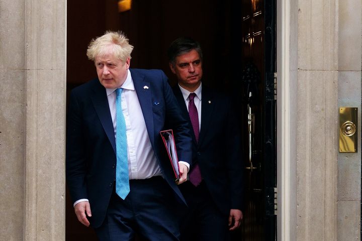 Boris Johnson leaves 10 Downing Street with Ukrainian ambassador Vadym Prystaiko